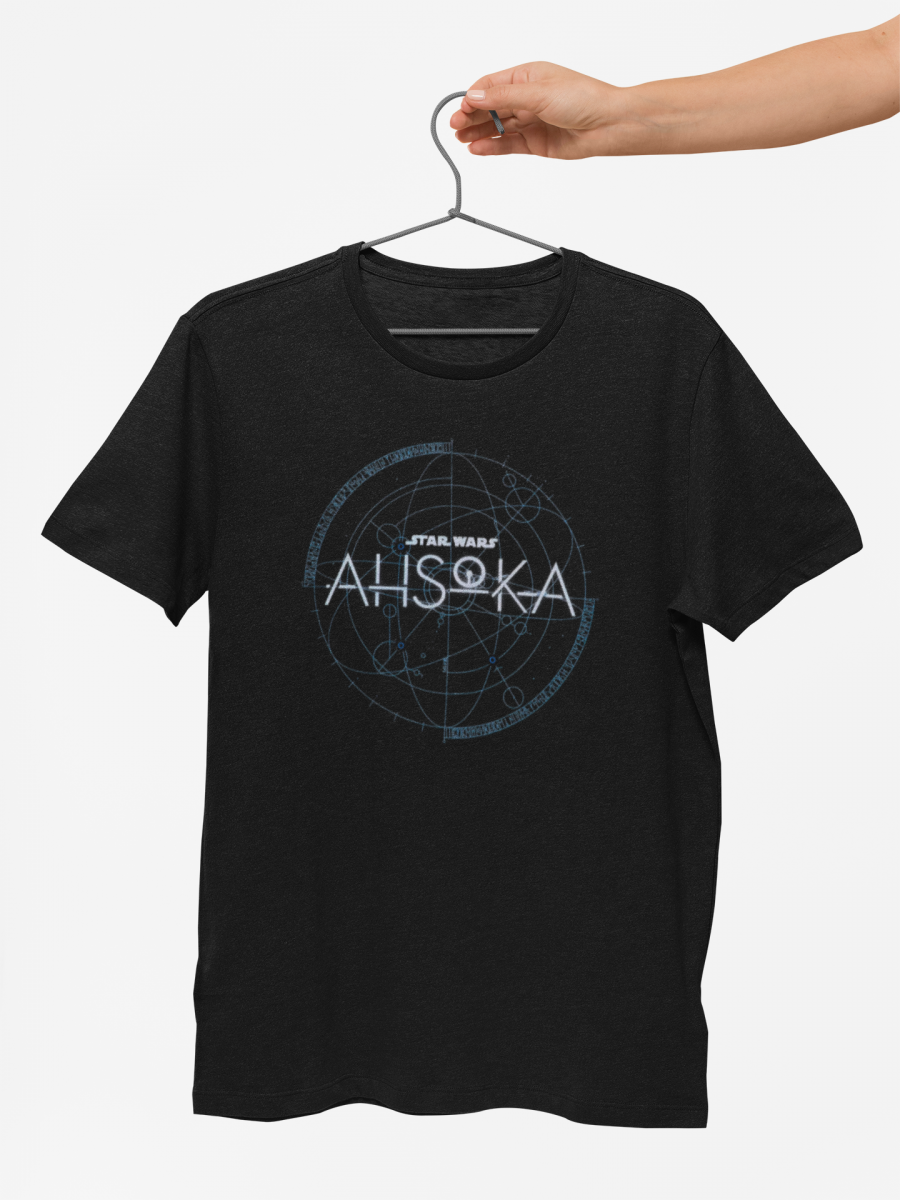 mockup-of-a-hand-holding-a-t-shirt-against-a-minimalist-background-27687